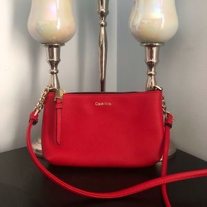 Never-used Calvin Klein red crossbody bag